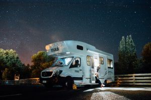 image of a white motorhome at night